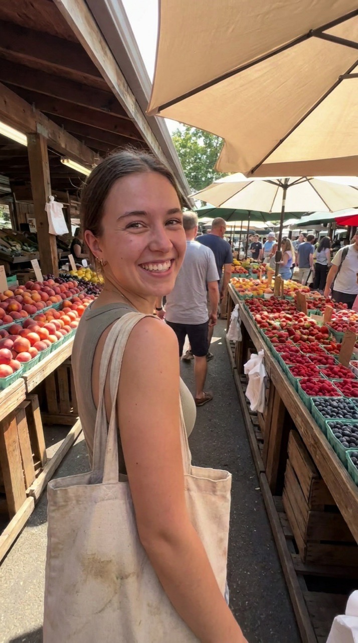 A woman walking through a market